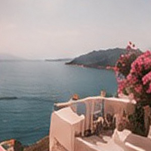 Coastal buildings and sea from the supplied travel photograph